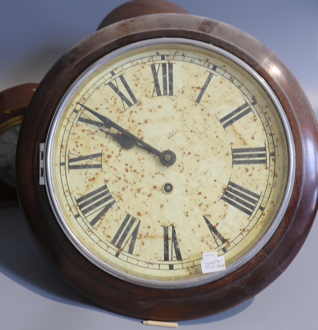 An early 20th century Goldsmiths & Silversmiths amboyna cased mantel clock, width 41cm, together with two other mantel clocks and a wall dial